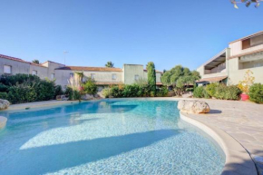 Pavillon pour 4 personnes dans une résidence avec piscine